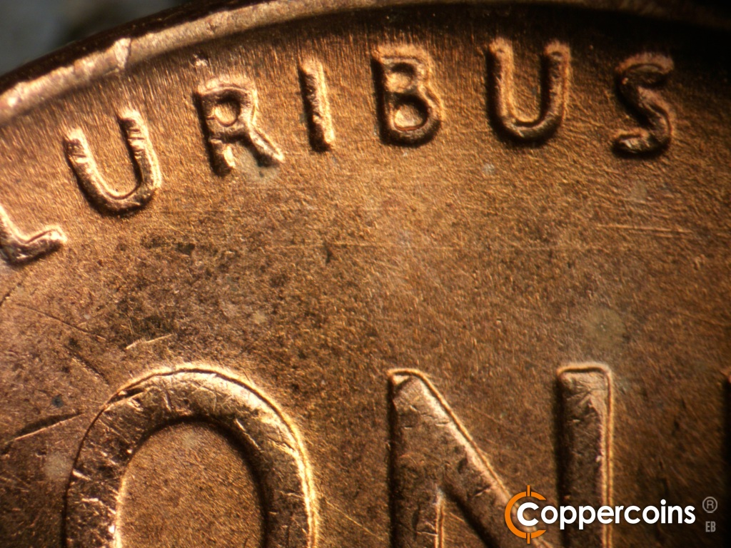 Die-stage A marker on 1951D•1MM•006 showing Die scratches through PLURIBUS.
