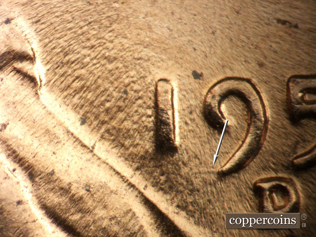 Die-stage C marker on 1951D•1MM•071 showing Worn E/W die gouge from bottom o 9 in date.