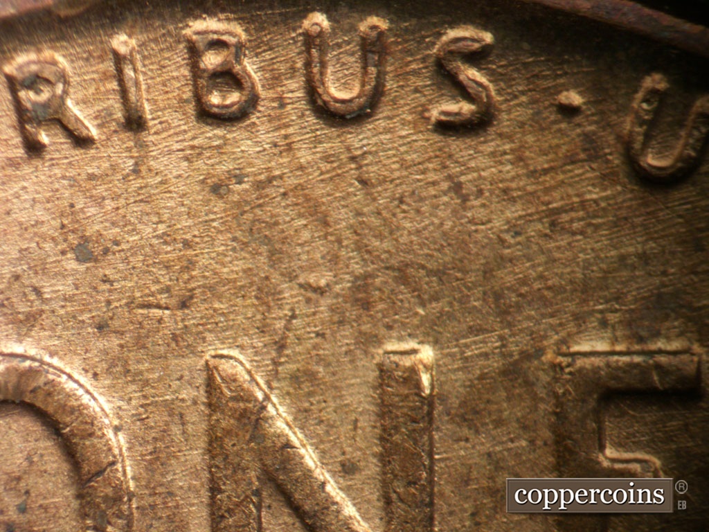 Die-stage A marker on 1951P•1DO•003 showing Die scratches above ONE.