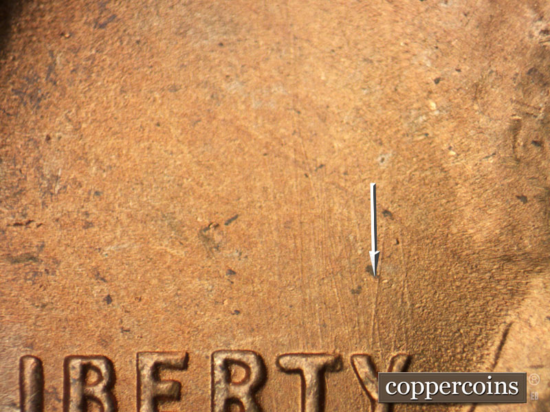 Die-stage B marker on 1951S•1DO•001 (1951 Doubled Die Obverse).