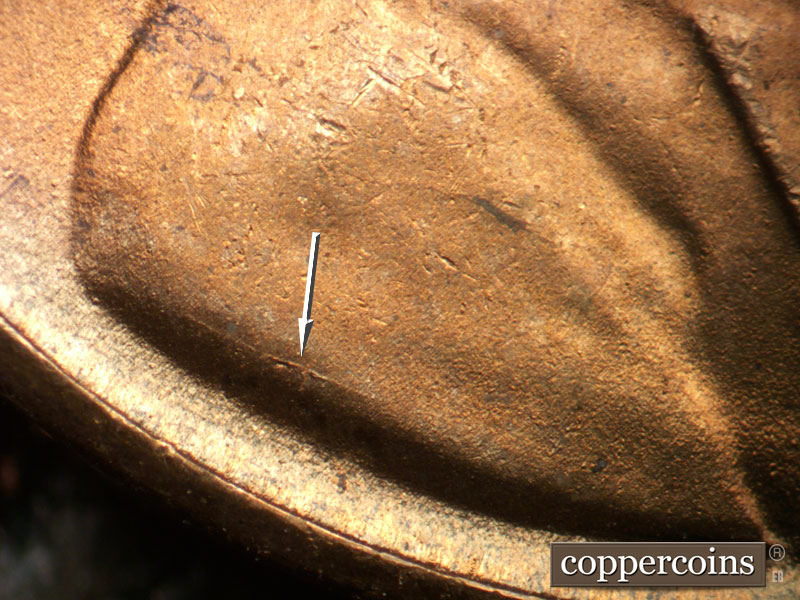 Die-stage B marker on 1951S•1MM•018 (1951 Repunched Mint Mark).