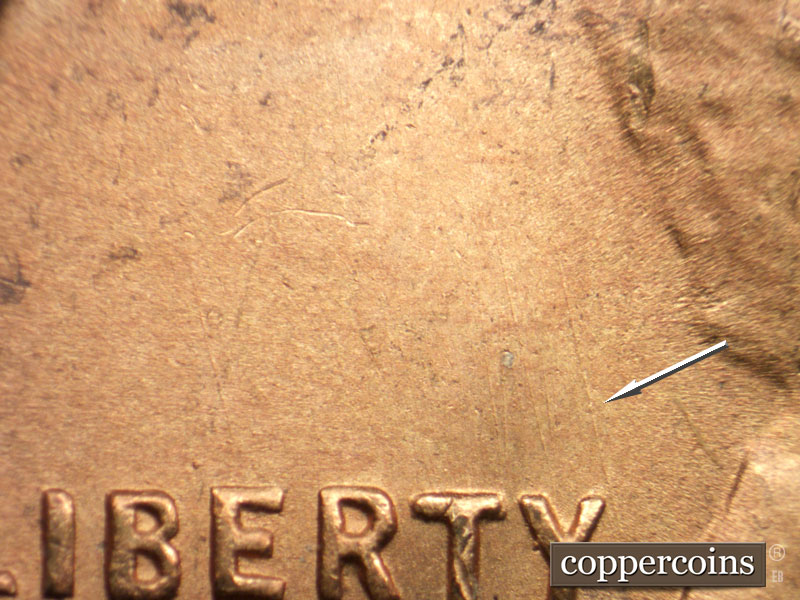 Die-stage B marker on 1951S•1MM•023 (1951 Repunched Mint Mark).