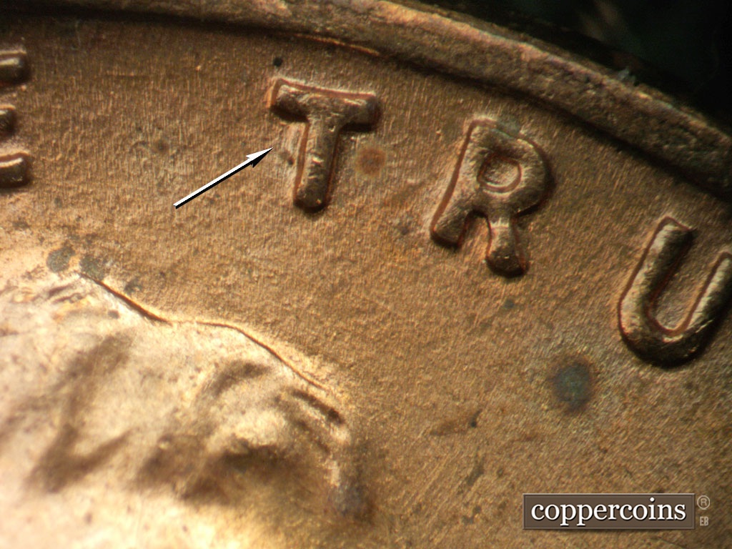 Die-stage B marker on 1952D•1DO•010 showing Doubling see on vertical bar of first T in TRUST.