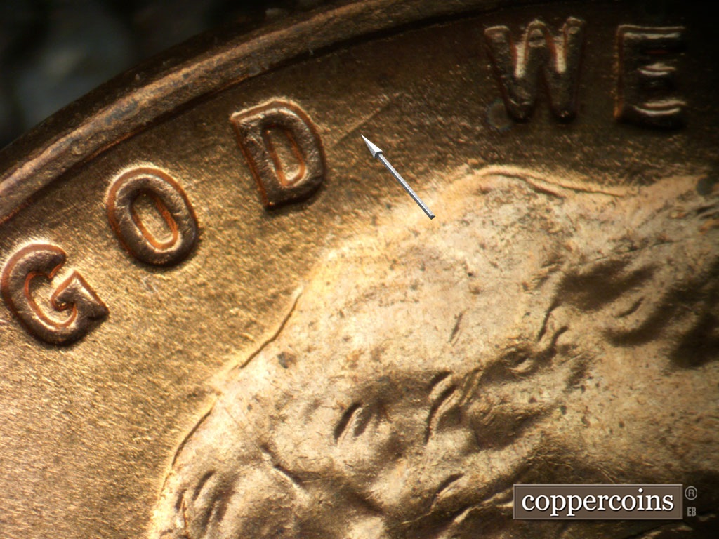 Die-stage B marker on 1952D•1DO•010 showing Heavy NE die gouge from D in GOD.
