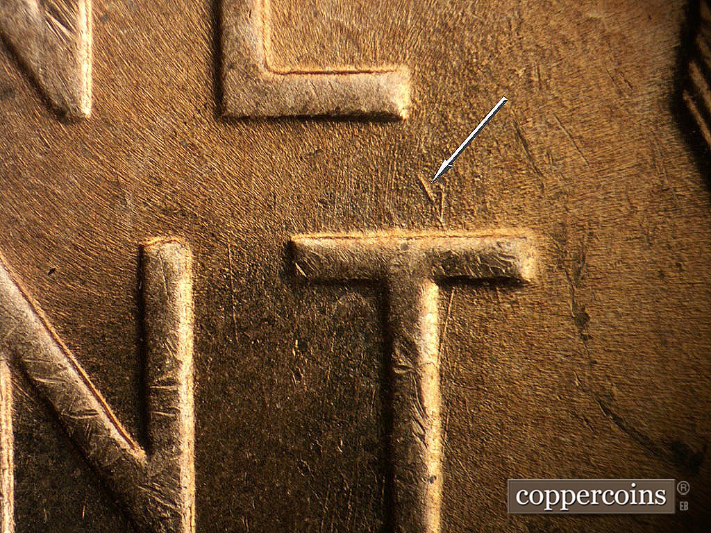 Die-stage A marker on 1952D•1MM•002 showing Die gouge above T in CENT.