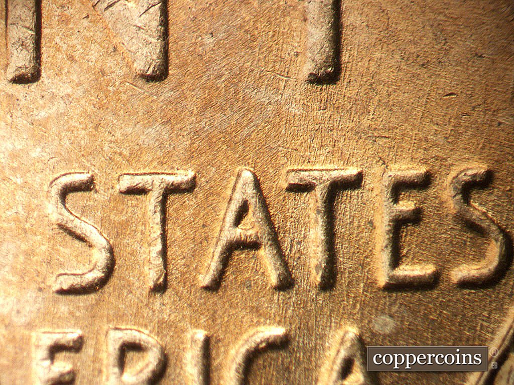 Die-stage A marker on 1952D•1MM•002 showing Die scratches through ATE in STATES.