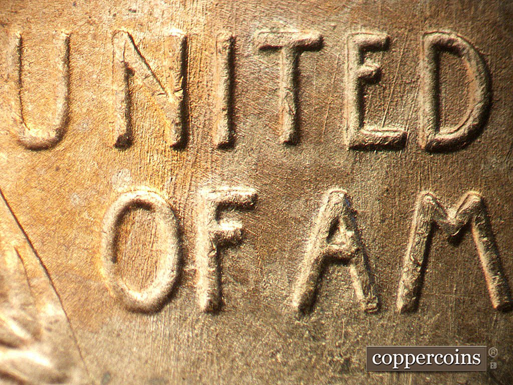 Die-stage A marker on 1952D•1MM•002 showing Die scratches through NI in UNITED and OF, NNE die scratches in E of UNITED.