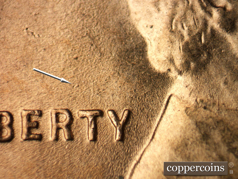 Die-stage B marker on 1952D•1MM•002 (1952 Repunched Mint Mark).