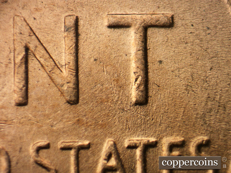 Die-stage B marker on 1952D•1MM•002 (1952 Repunched Mint Mark).