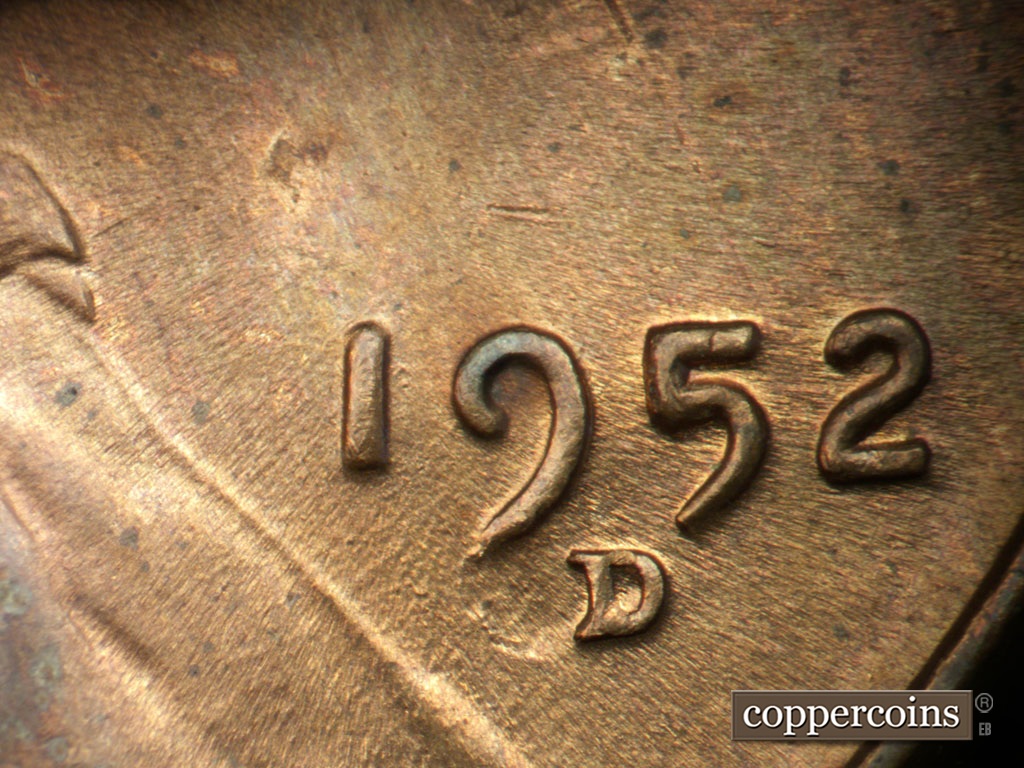 Die-stage C marker on 1952D•1MM•061 showing Date for reference. Die crack devolping from bottom of 9 in date.