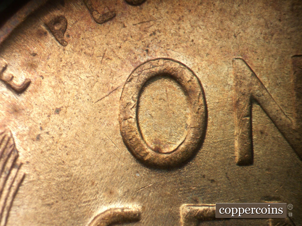 Die-stage C marker on 1952D•1MM•061 showing Worn ENE die scratches connect ON in ONE.