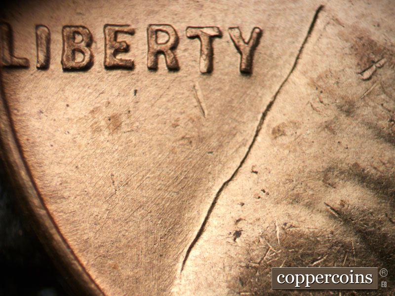 Die-stage B marker on 1952D•1MM•063 (1952 Repunched Mint Mark).
