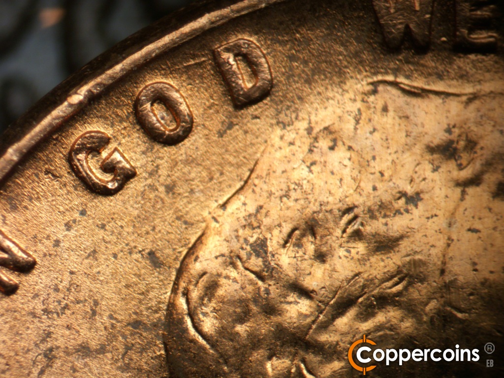 Die-stage B marker on 1952D•1MM•088 showing WSW die scratch from top of D in GOD.