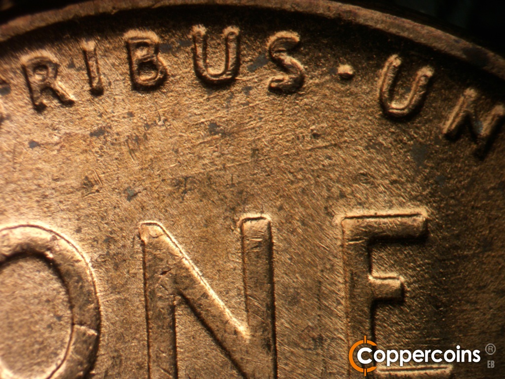 Die-stage B marker on 1952D•1MM•088 showing ENE die scratches above ONE.