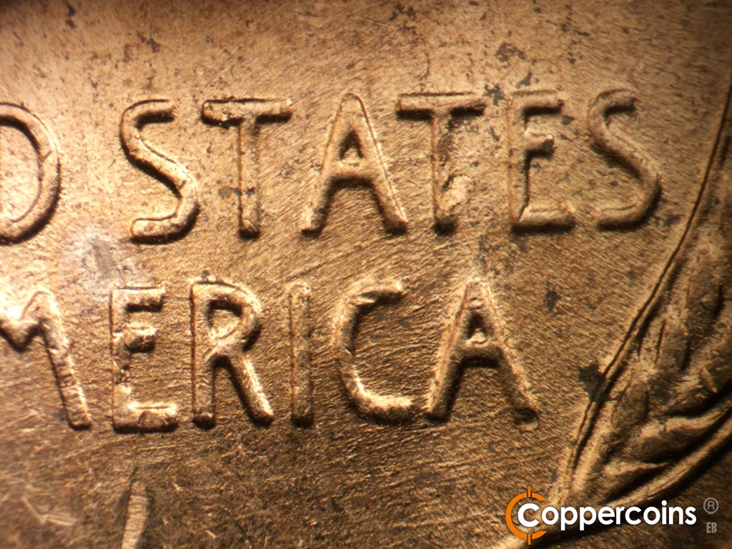 Die-stage B marker on 1952D•1MM•088 showing NE die scratch under A in STATES.