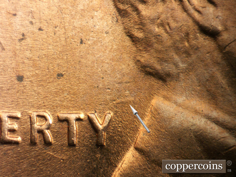 Die-stage B marker on 1952D•1MM•090 (1952 Repunched Mint Mark).