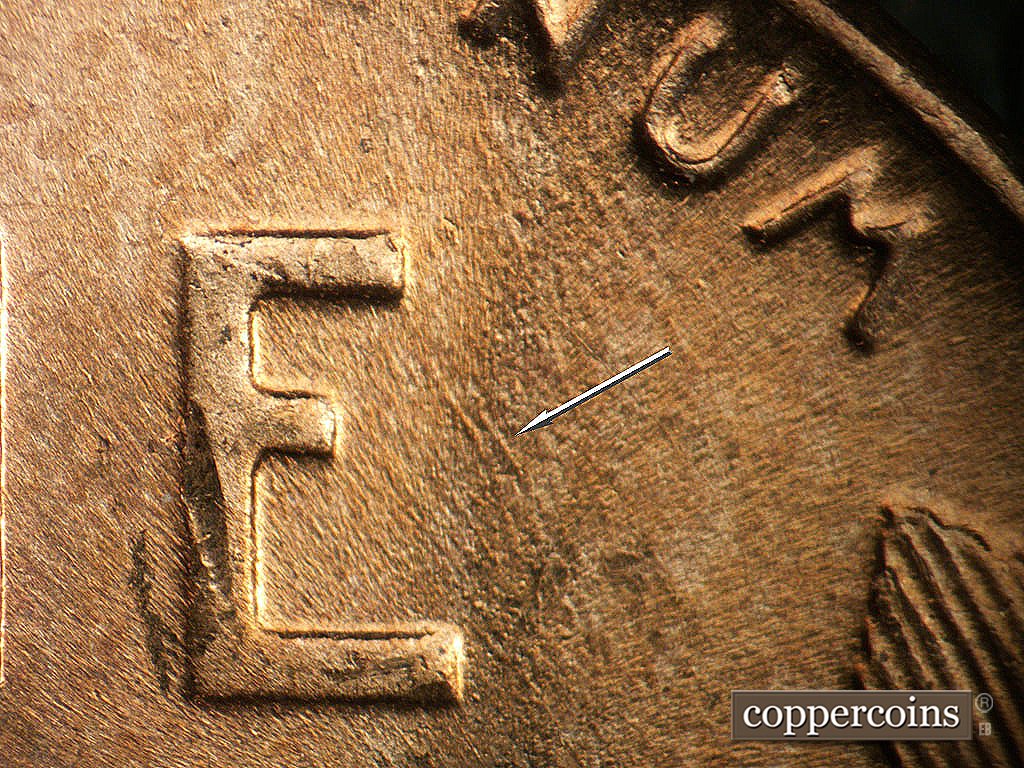 Die-stage B marker on 1952D•1MM•092 showing SE die scratches near E in ONE.