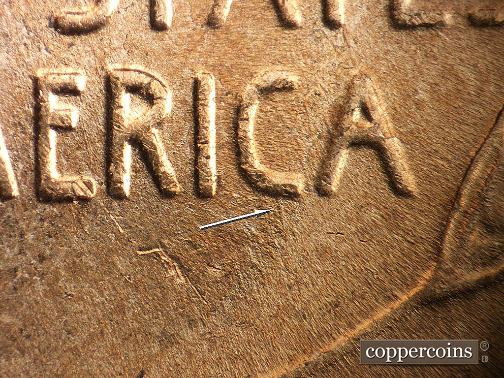 Die-stage B marker on 1952D•1MM•092 showing DIe scratch from bottom of C in AMERICA.