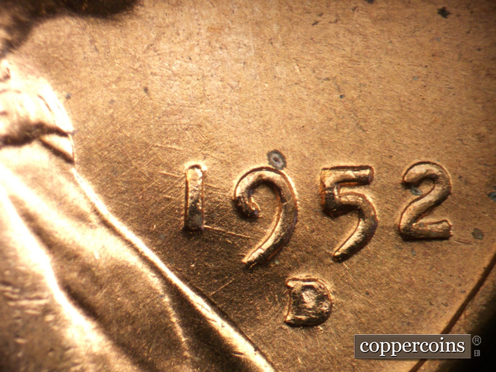 Die-stage A marker on 1952D•1MM•093 showing Die scratches through 1 in date.