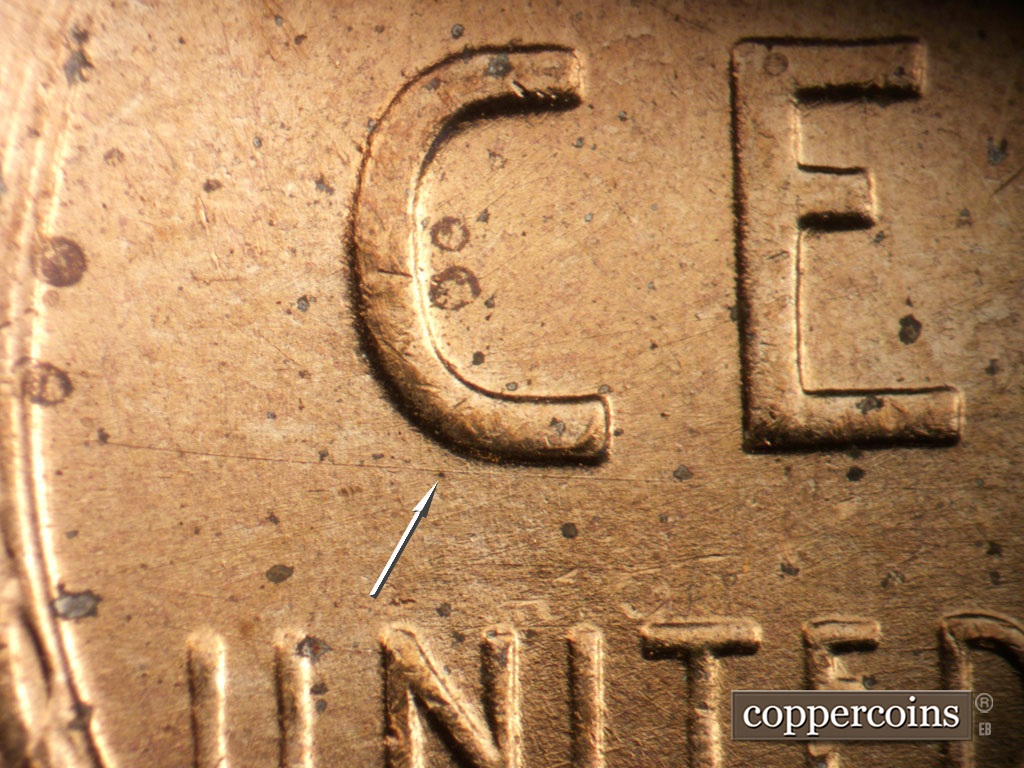 Die-stage A marker on 1952D•1MM•093 showing ESE die scratch under C in CENT.
