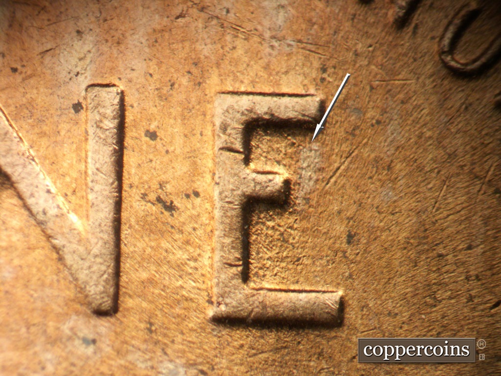 Die-stage B marker on 1952D•1MM•094 showing Worn die scrates inside E of ONE.