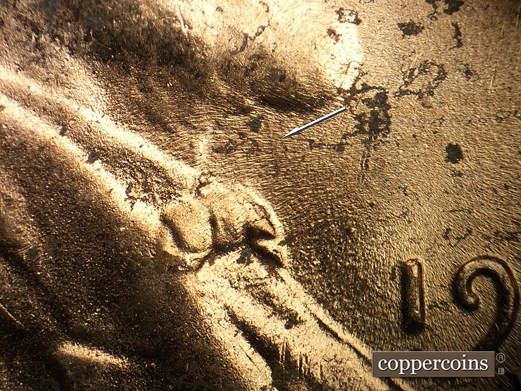 Die-stage C marker on 1952D•1MM•097 showing Light die clash at throat.