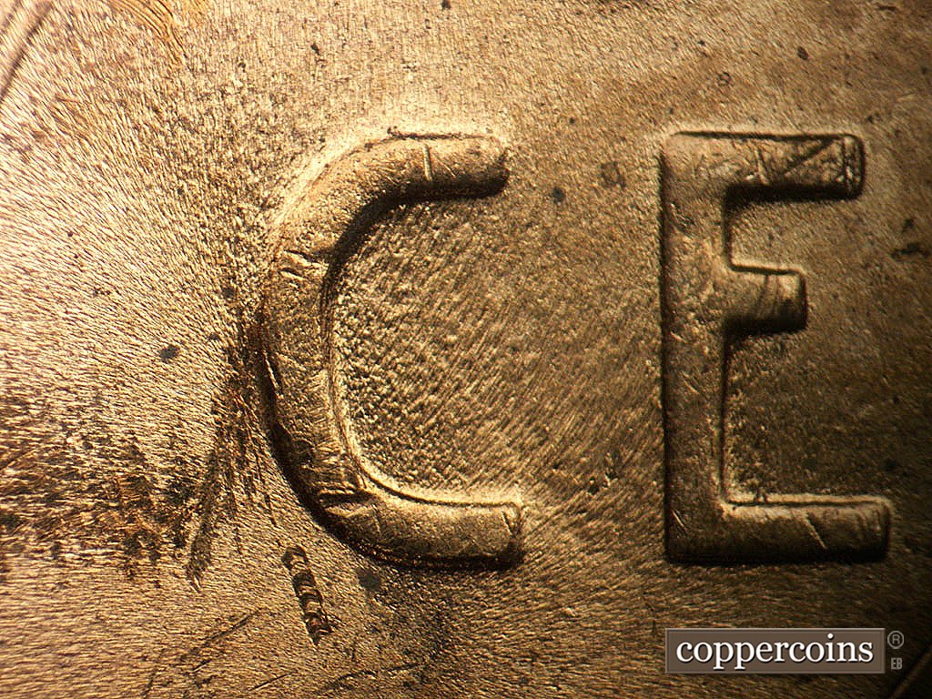 Die-stage C marker on 1952D•1MM•097 showing Die clash in C of CENT.