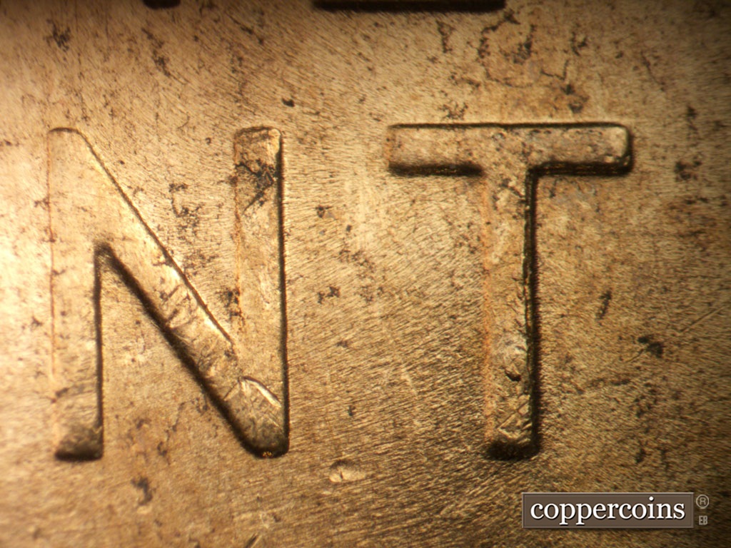 Die-stage B marker on 1952D•1MM•098 showing Die chipping on T in CENT.