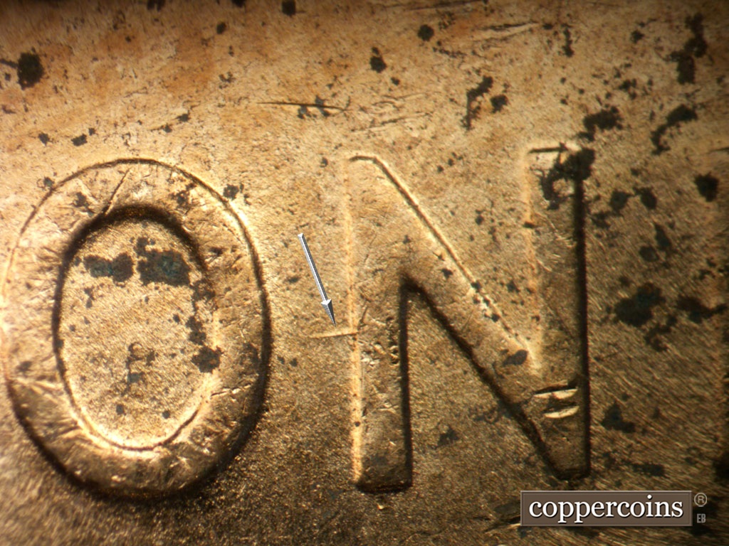 Die-stage C marker on 1952D•1MM•099 showing Heavy scratch from left side of N in ONE.
