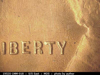 Die-stage B marker on 1952S•1MM•018 (1952 Repunched Mint Mark).