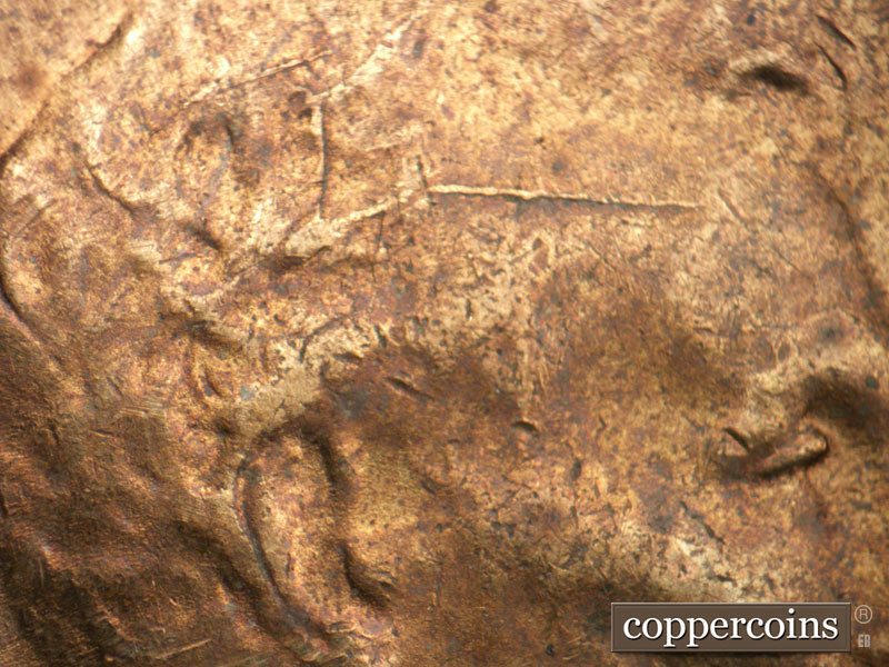 Die-stage B marker on 1952S•1MM•027 (1952 Repunched Mint Mark).
