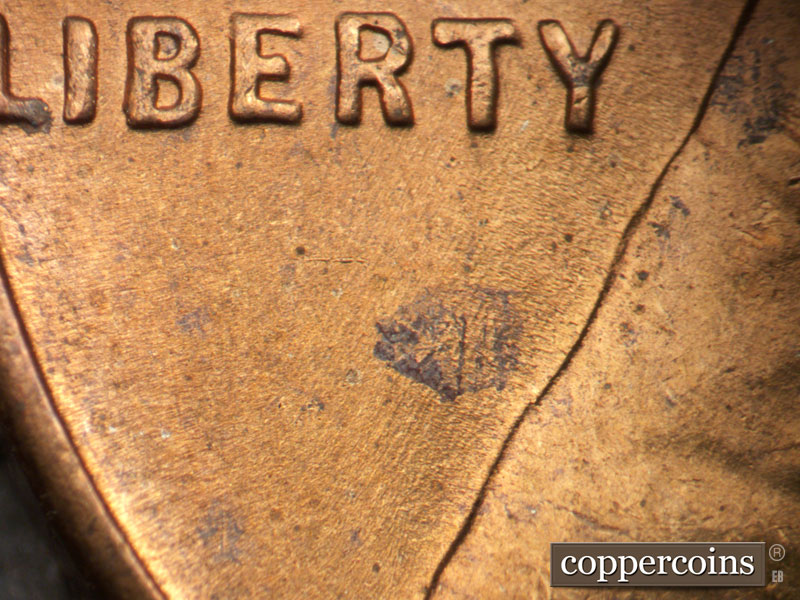 Die-stage B marker on 1952S•1MM•032 (1952 Repunched Mint Mark).