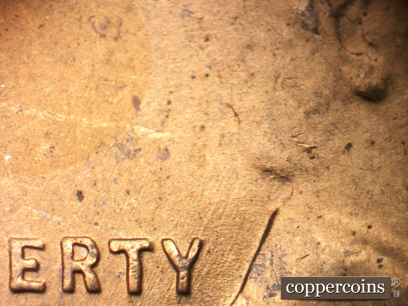 Die-stage B marker on 1952S•1MM•032 (1952 Repunched Mint Mark).