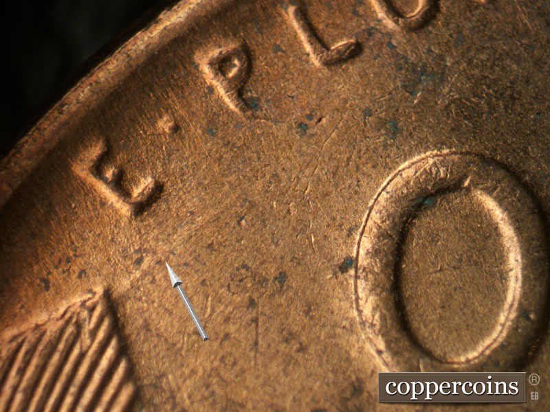 Die-stage B marker on 1953D•1DO•004 (1953 Doubled Die Obverse).