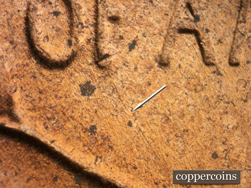 Die-stage B marker on 1953D•1DO•004 (1953 Doubled Die Obverse).