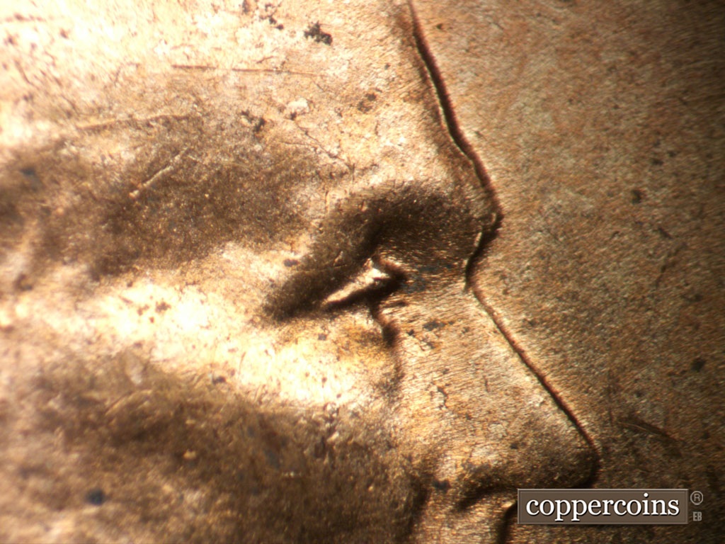 Die-stage B marker on 1953D•1DO•009 showing Extra eyelid south of primary.