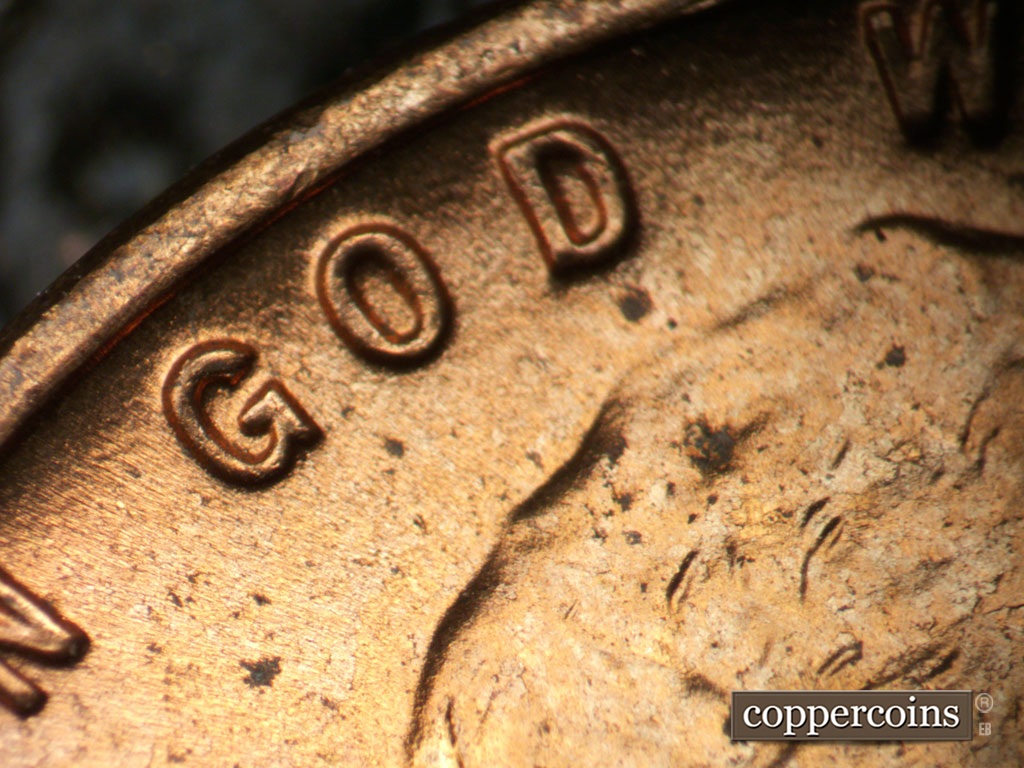 Die-stage B marker on 1953D•1DO•009 showing Closeup of GOD.
