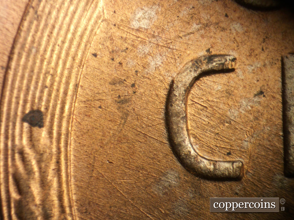 Die-stage A marker on 1953D•1MM•026 showing Die scratches through C in CENT.