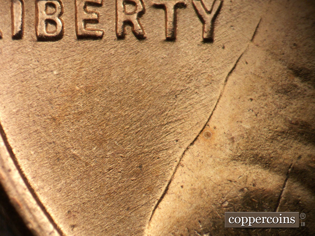 Die-stage B marker on 1953D•1MM•031 showing Light WSW die scratches in field under LIBERTY.