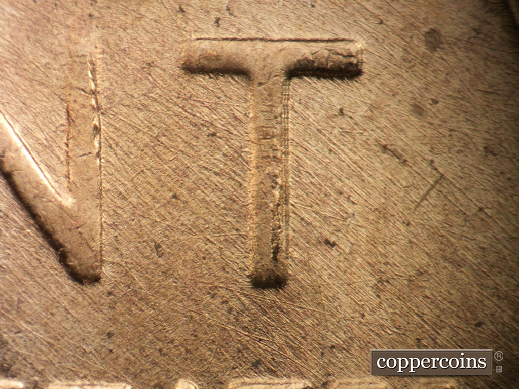 Die-stage B marker on 1953D•1MM•031 showing Die chips on vertical bar of T in CENT.