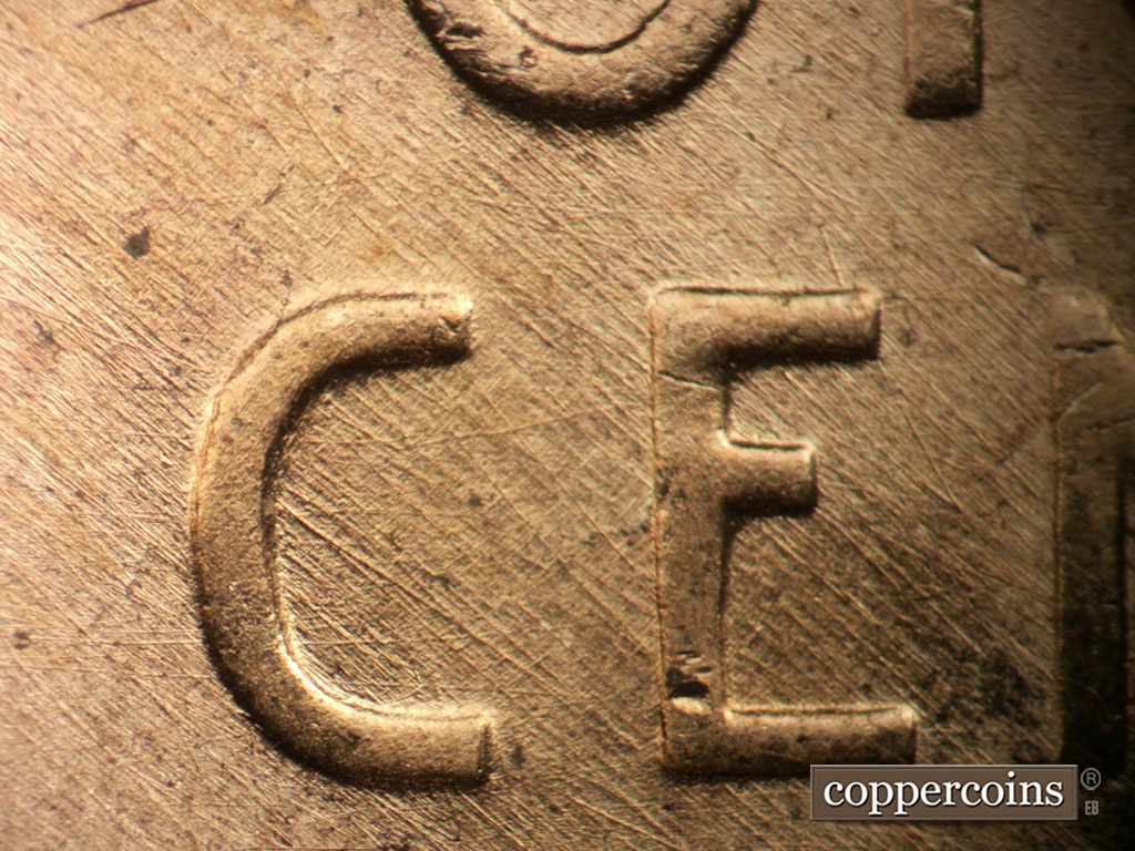 Die-stage B marker on 1953D•1MM•031 showing Generally SE die scratches through C in CENT. A curved die scratch connect inner C to E in CENT.