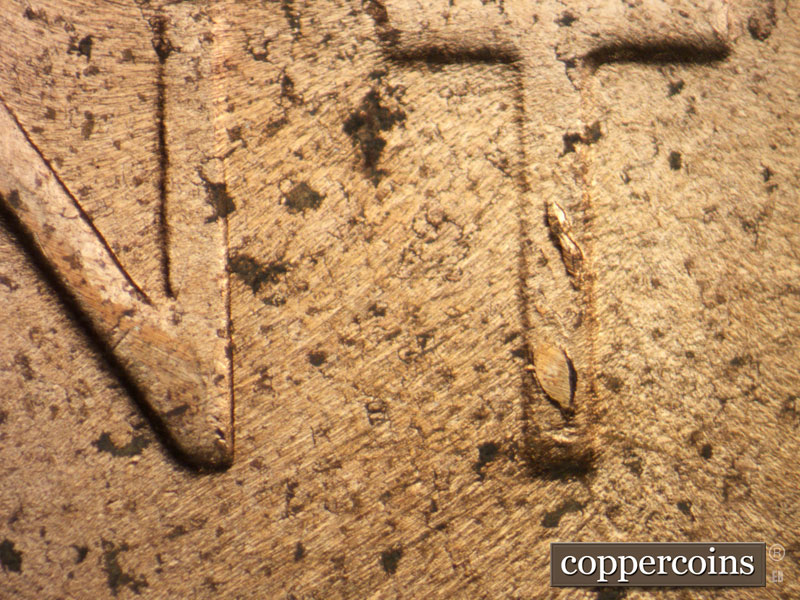 Die-stage C marker on 1953D•1MM•053 showing Die chipping on vertical of T in CENT.