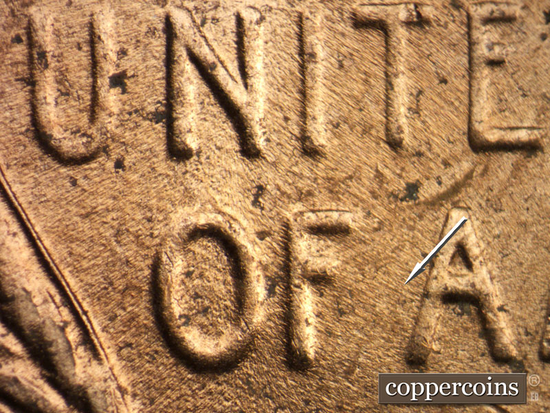 Die-stage C marker on 1953D•1MM•053 showing NW die scratch from first A in AMERICA.