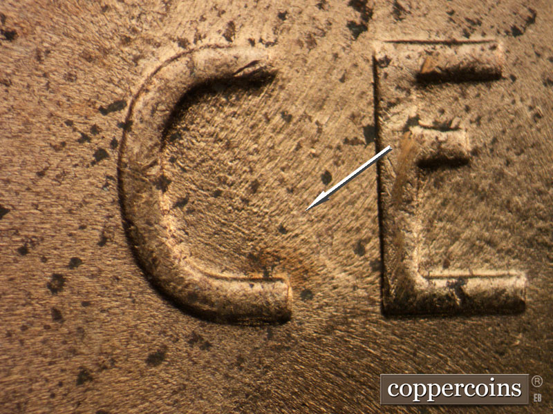 Die-stage C marker on 1953D•1MM•054 showing Die clash in C of CENT.