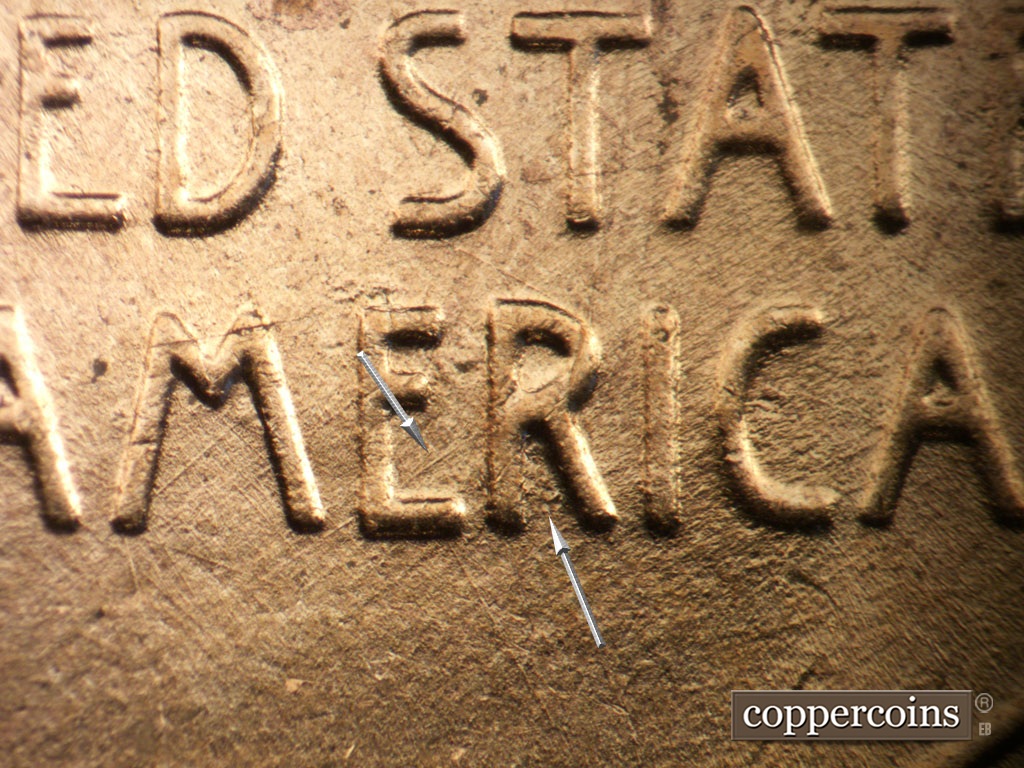 Die-stage B marker on 1953D•1MM•054 showing Die dots in loer R in AMERICA. NE die scratch from lower E in AMERICA.