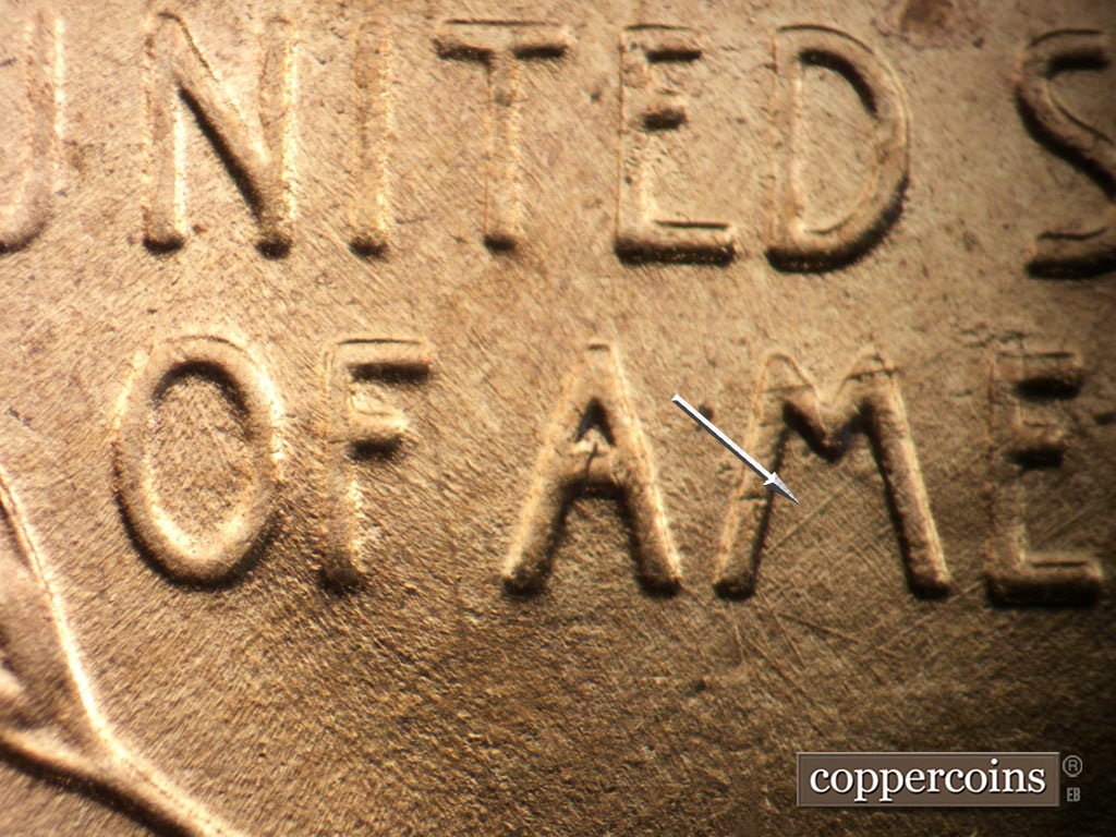 Die-stage B marker on 1953D•1MM•054 showing SW die scratch inside M in AMERICA.