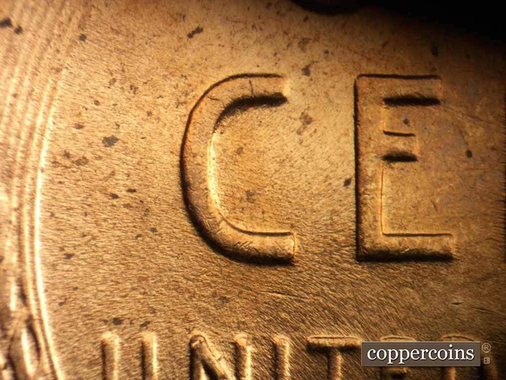 Die-stage B marker on 1953D•1MM•067 showing Light ESE die scratches in C of CENT.