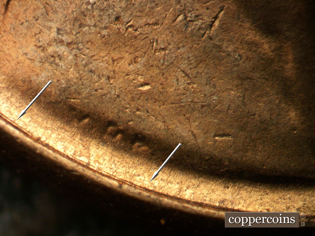 Die-stage A marker on 1953P•1DO•003 showing Concentric scratch between VDB and rim.