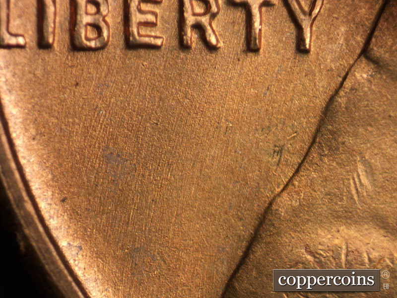 Die-stage B marker on 1953S•1DO•001 (1953 Doubled Die Obverse).