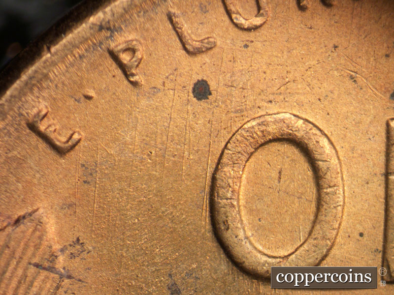 Die-stage B marker on 1953S•1DO•001 (1953 Doubled Die Obverse).